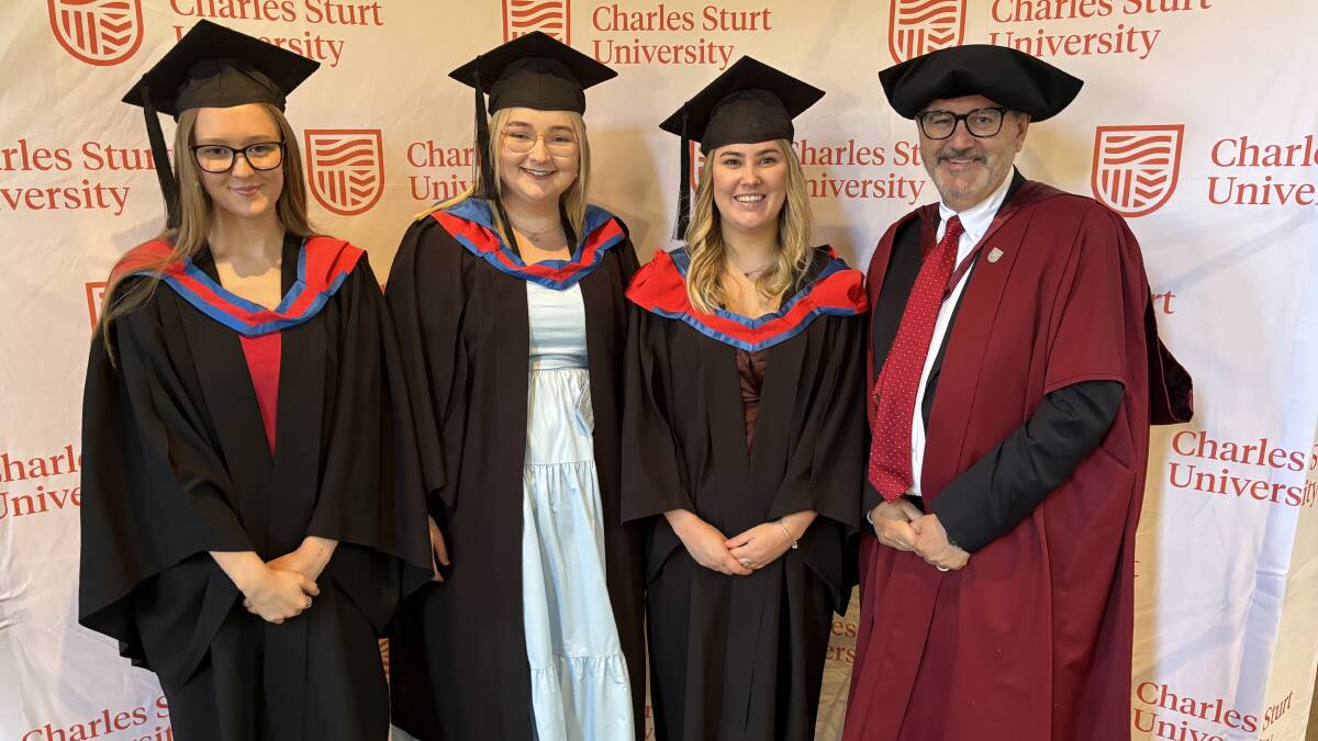 CSU graduates Katie Mitchell from Crookwell (B. Psych), Montanna Bean from Wagga (B. Psych - Hons), Madolyn Humphries from Wagga (B. Psych - Hons) and faculty of business, justice and behavioural sciences executive dean Lewis Bizo. Picture contributed