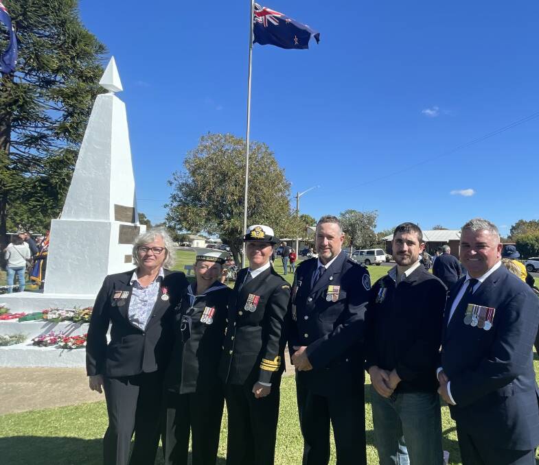 Pictured are Gill Wallace, Julie Waller, Annie-Maree Schofield, Craig and Jack Bardney, and Chris Wallace at the Yenda cenotaph on Anzac Day. Picture by Allan Wilson
