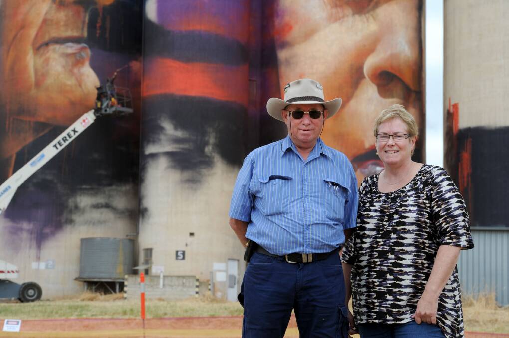 TOURISM: Don and Sue Flynn from Roxby Downs visit silos at Sheep Hills as they were being painted. Picture: OLIVIA PAGE