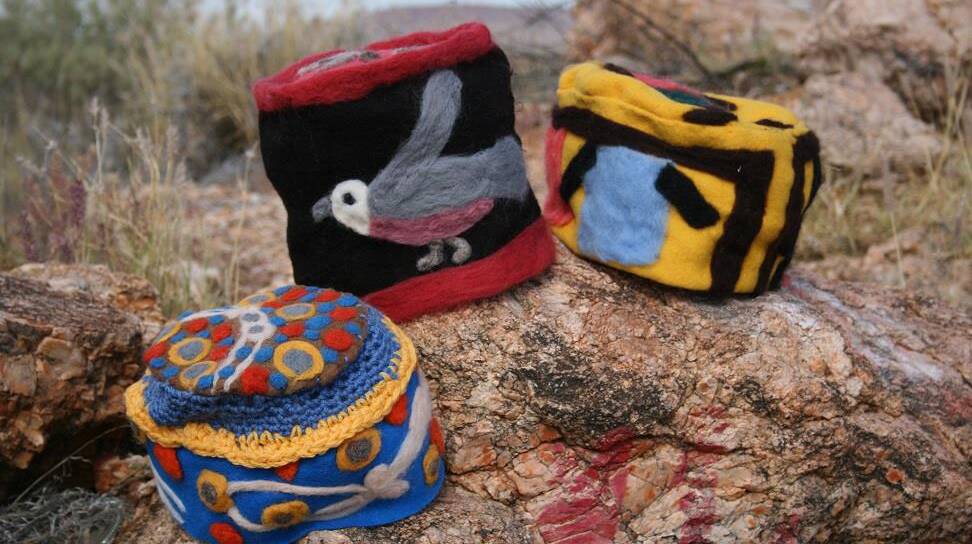 COLOURFUL CREATIONS: The exhibition includes a number of pieces selected from The Alice Springs Beanie Festival. Picture: Supplied
