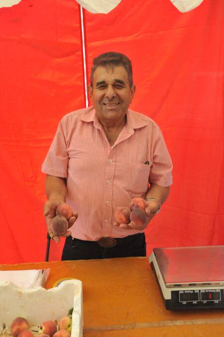 Ray Pagano sells fresh fruit at the event in Binya.