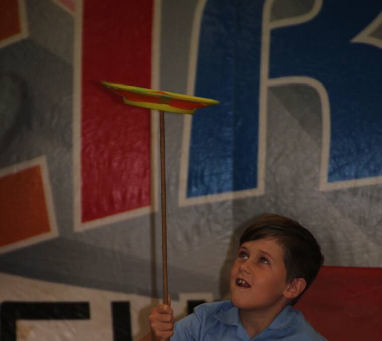 SKILLS ON SHOW: Jonah DeRossi impresses with his impressive balancing skills as he concentrates on his spinning plate in the circus skills workshop.