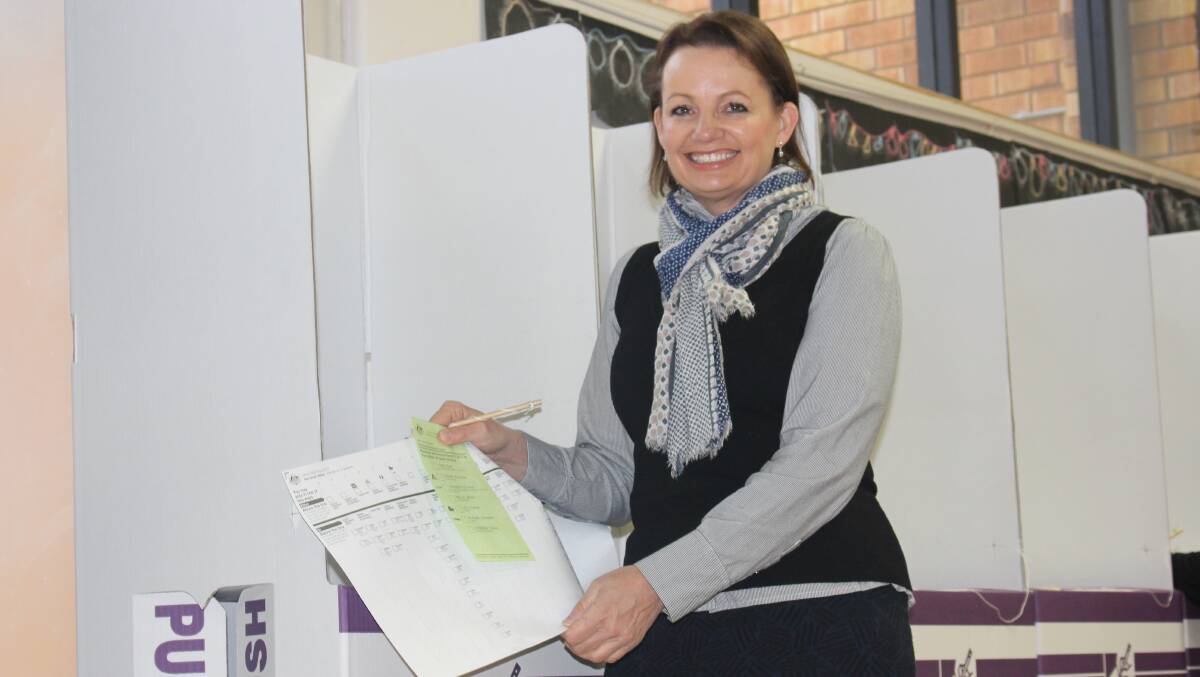 Sussan Ley votes at Griffith shortly after 8am.