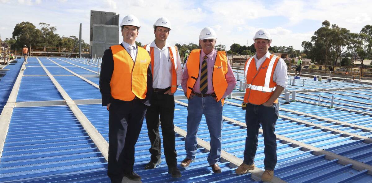 IMPRESSED: James Shields, Shaun Deaton, John Dal Broi and Richard Stamp check out the site. Picture: Supplied