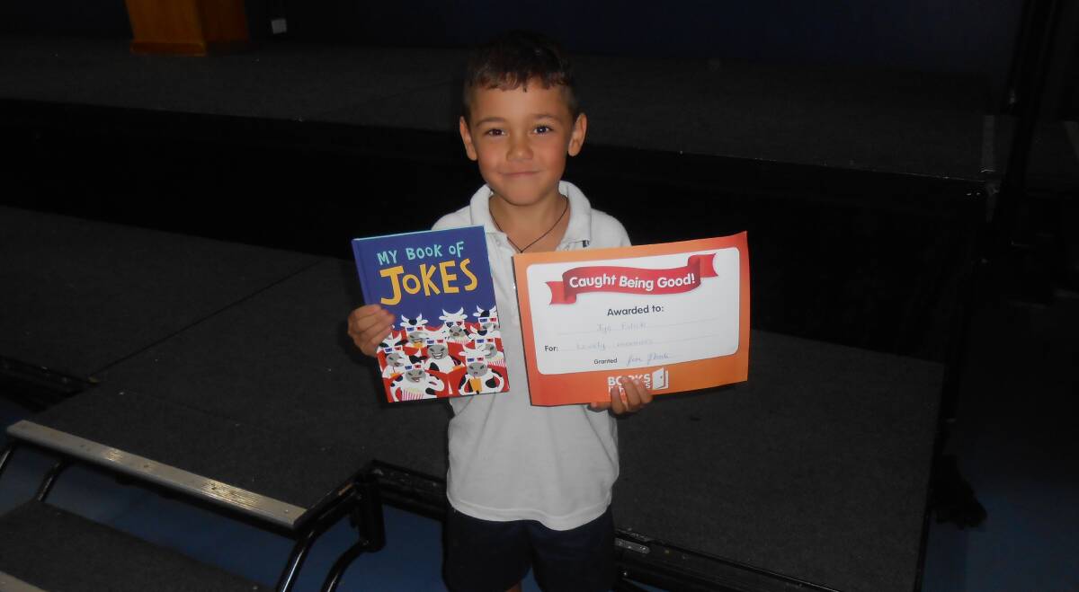 EXCITED: Griffith Public School pupil Jye Eslick is all smiles with his new book. Picture: Supplied