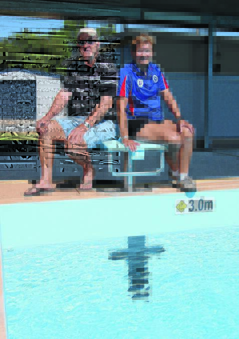 CELEBRATE: Barellan pool managers Emil (left) and Heather White have called on the community to mark the pool's 50th anniversary on Friday. 