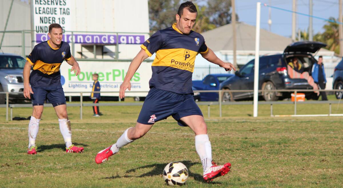 FORWARD: Mitch Bagiante looks to clear this ball against Hanwood FC last week. Picture: Riley Krause.