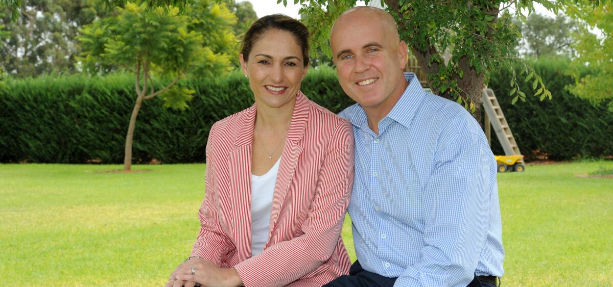 COMMITTED TO MURRAY ELECTORATE: Adrian Piccoli celebrates with his wife Sonia after being re-elected on Saturday. Picture: Anthony Stipo