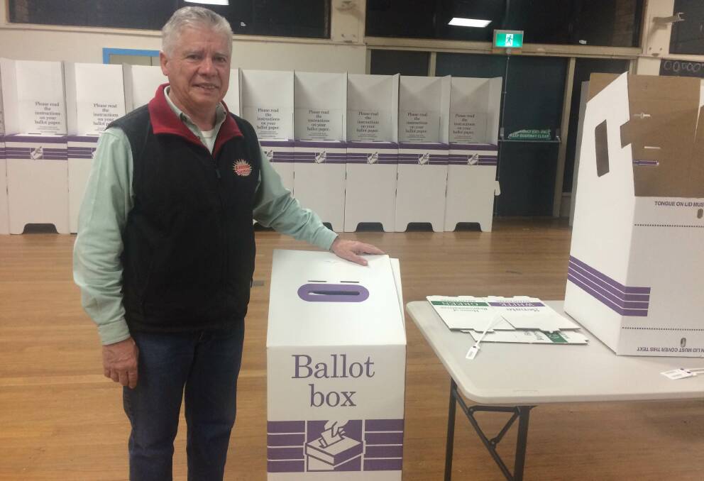OFFICER IN CHARGE: Denny Fachin is ready for a long day assisting people vote. Picture: Monique Patterson
