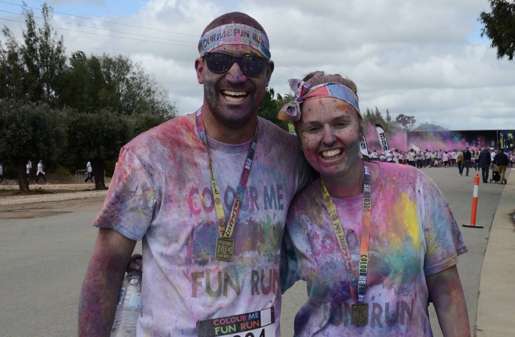 Ben Tupou and Kate Huckle were drenched in all colours of the rainbow 
