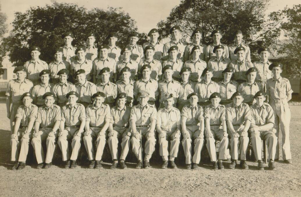 RECRUITS: Standing in the back row Jim McGann is pictured with National Service recruits from Griffith, Leeton, Narrandera and Hay at Puckapunyal in 1954.