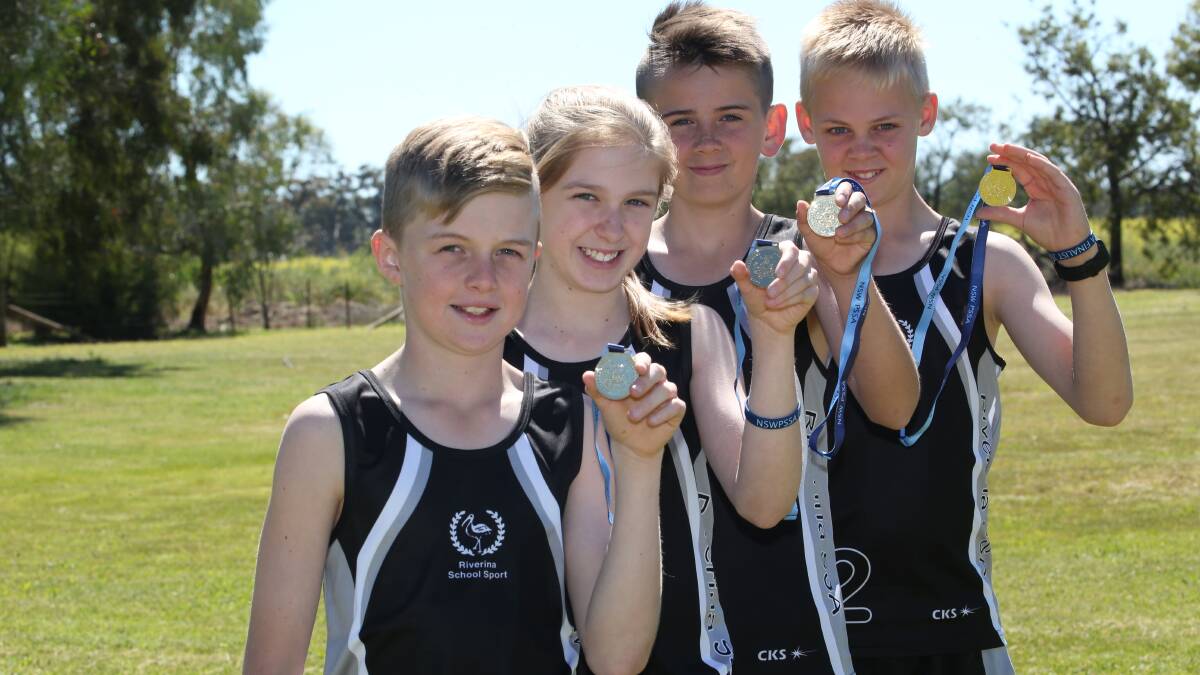 State relay winners Tharbogang Public School students, Jyden Harris, Georgia Williams, Michael Cudmore and Lachlan Robertson