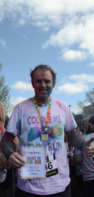 First man across the line at the Colour Me Fun Run was John Coughlan