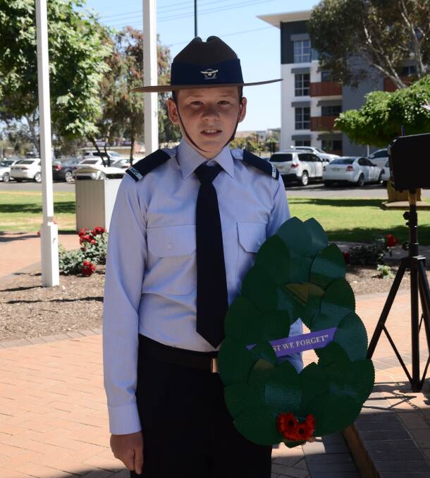 LEST WE FORGET: Australian Air Force cadet Dylan Garner pays tribute to our fallen soildiers on Remembrance Day.