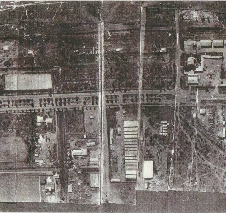 HISTORY: Griffith photographed from above shortly after World War II from a Tiger Moth aeroplane. Long gone are the tennis courts, cannery and small hospital from what is now Griffith's CBD.
