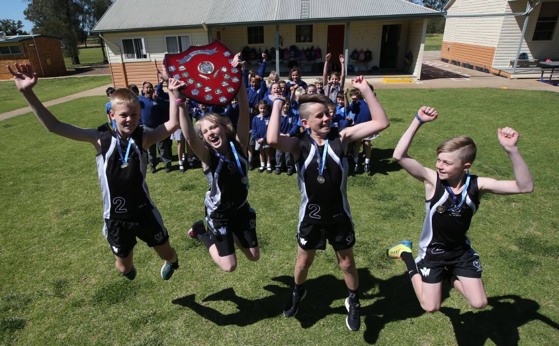 STATE CHAMPIONS: The Riverina relay team represented by Tharbogang Public School students Lachlan Robertson, Georgia Williams, Michael Cudmore, and Jyden Harris have won state.