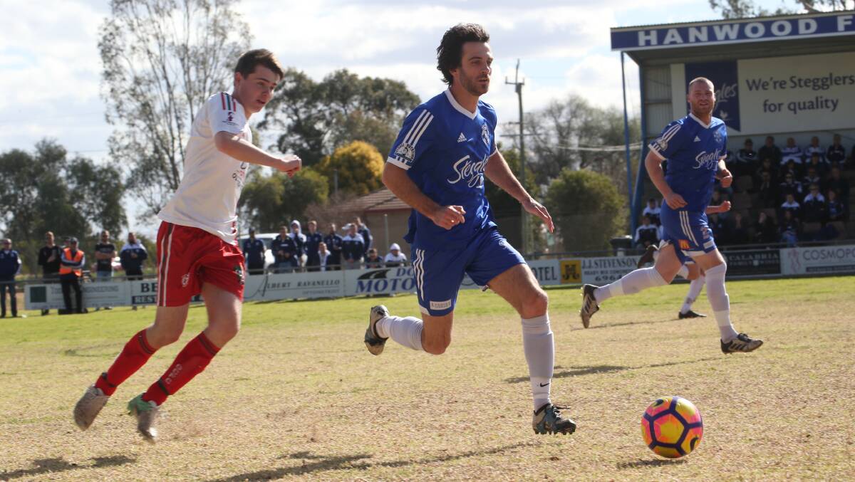 Hanwood FC's Philip Middlemiss in action against Griffith City late last season. 