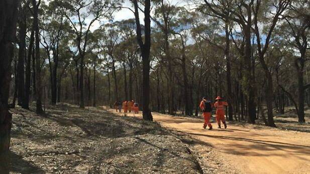 SES crews search for the body of Simone Quinlan in bushland near Kangaroo Flat after her murder in Melton in August 2015.