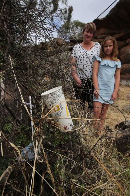 DISAPPOINTED: Sharon and Jessica Brown are disappointed at the amount of rubbish being left behind at local attraction Scenic Hill. PHOTO: Anthony Stipo.