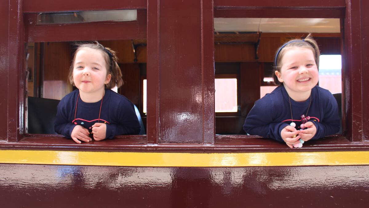 FULL OF STEAM: Ella and Sophie Nolan on board the Tin Hare. Picture: Hannah Higgins.