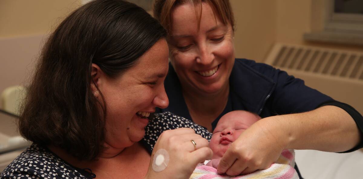 ALL SMILES: Annemarie Eade and Jill Graham with baby Joshua Thomas Eade-Smith who is not yet 12 hours old. Picture: Anthony Stipo.