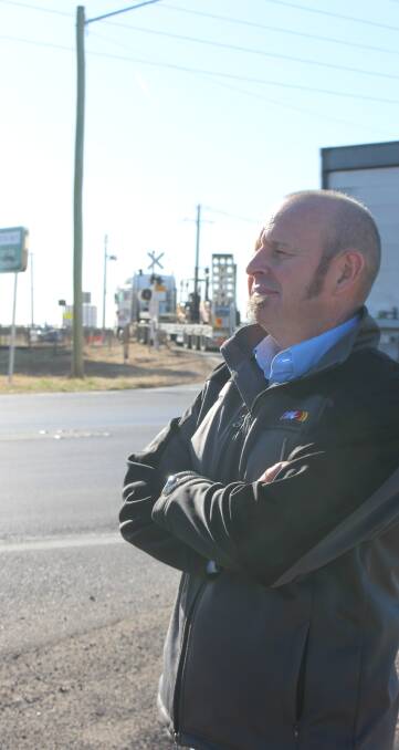 WORRIED: Chair of Griffith's transport committee Councillor Simon Croce at the notorious Yoogali intersection. Photo: Hannah Higgins.