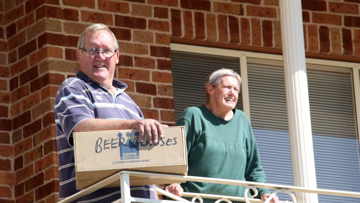 MOVING DAY: Jock and Doreen McDonald pack up their family home for a sea-change, the pair will be missed by the Griffith community. Picture: Anthony Stipo.