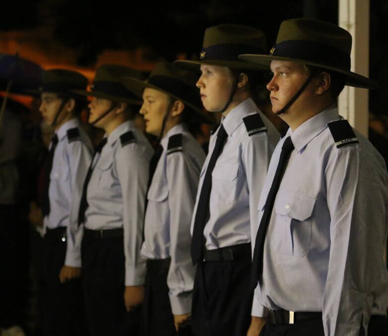GRIFFITH'S CADETS: Mitch Lane fronts a line of Airforce cadets present for the first time in 30 years at Griffith's dawn service. PHOTO: Anthony Stipo.