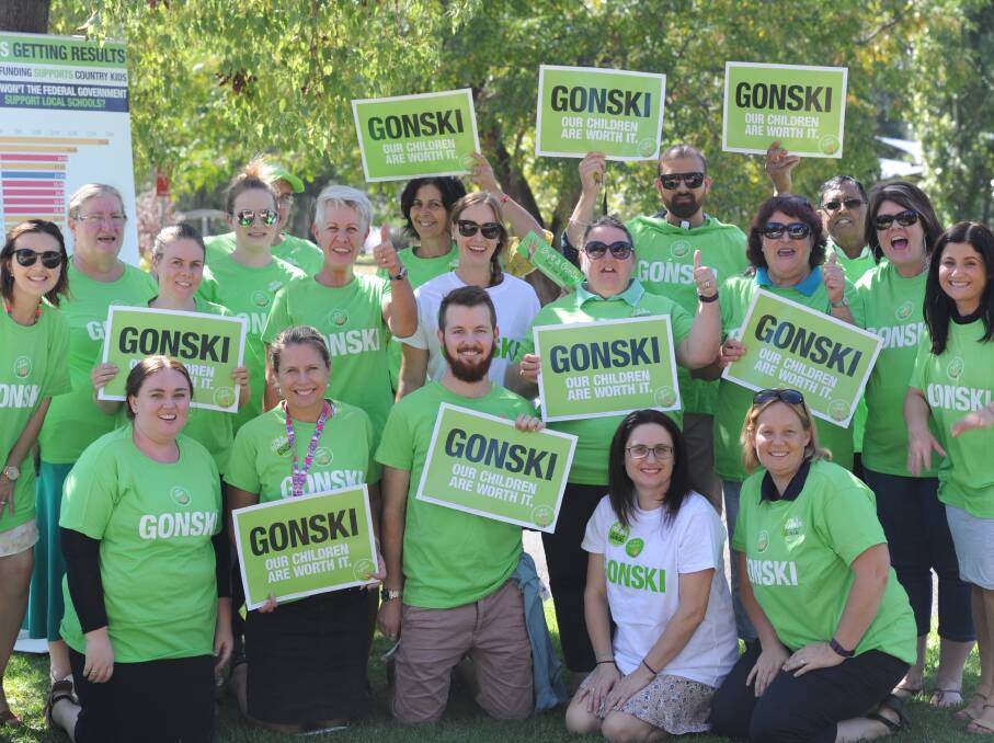 FIGHTING: A green army of educators was out in full force on Friday afternoon as the iconic Gonski bus came into town as part of a nation-wide campaign. PHOTO: Hannah Higgins.