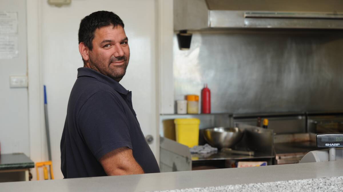 END OF AN ERA: Brendon Marcanio stands behind the counter at the soon to close Bilbul Store, he and Chiara Armanini have had to call it quits after it was no longer a viable business to run. PHOTO: Hannah Higgins.