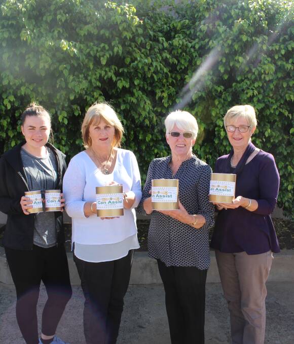 HELP NEEDED: Maddison Ramponi, Marion O'Connell, Margaret McCann and Judy Martin with the gold cans that will be throughout the town for generous donations. Pictures: Hannah Higgins.
