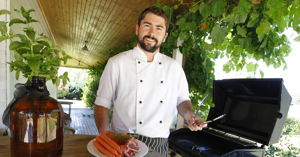 AUSSIE TRADITION: Coffee Niche chef Ryan Dedini prepares his Australia Day feast, which he said is best cooked on the barbecue. Picture: Les Smith