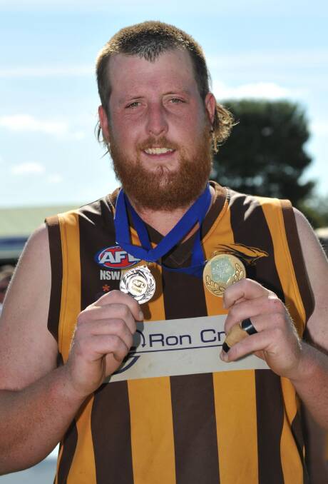 NEW SIGNING: Jordon Wood shows off his medals after being best-on-ground for East Wagga-Kooringal in the 2014 Farrer League reserve grade grand final. 