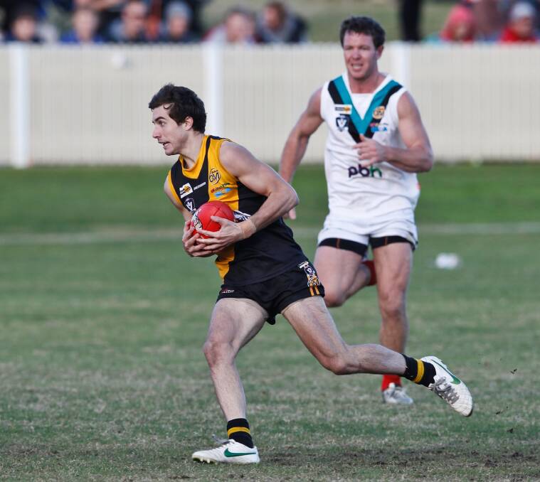 COUP: Toby Blissett in action for Albury Tigers in 2014. Blissett is set to return to Griffith. Picture: The Border Mail