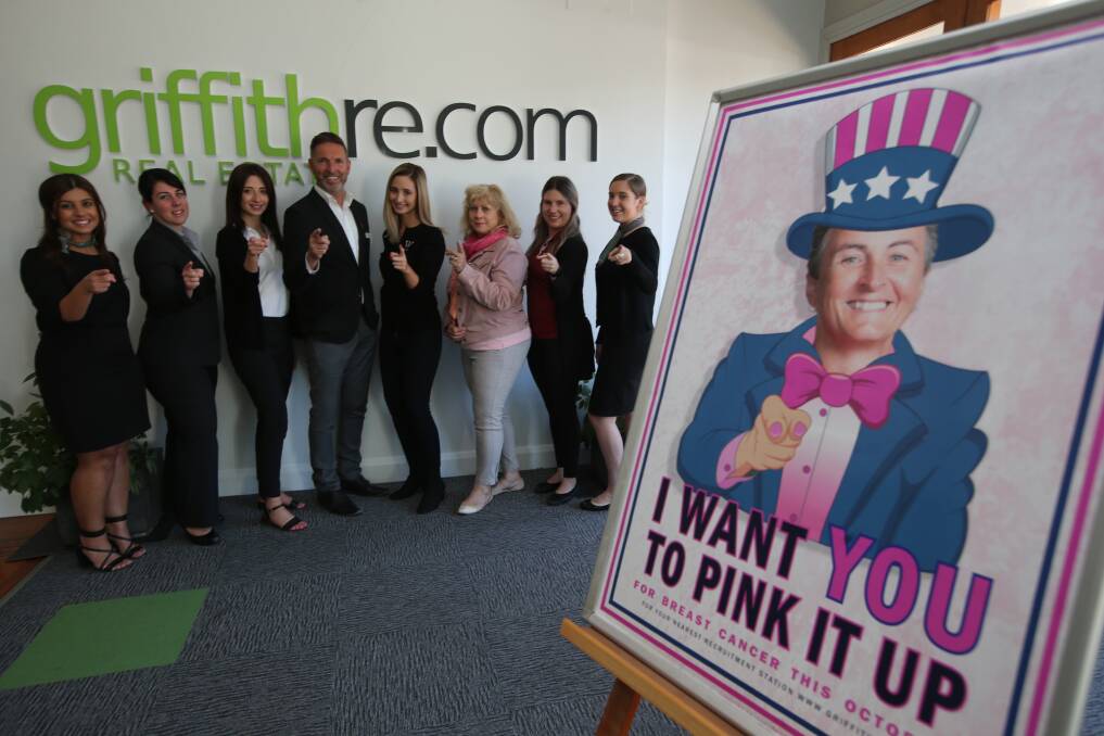 WE WANT YOU: Pink Up Griffith Committee's Santina Foscarini, Vicky McRae, Angela Codemo, Tony Santolin, Christina Quarisa, Ann Napoli, Kristie Favell and Elli Gill want you to join them. Picture: Anthony Stipo