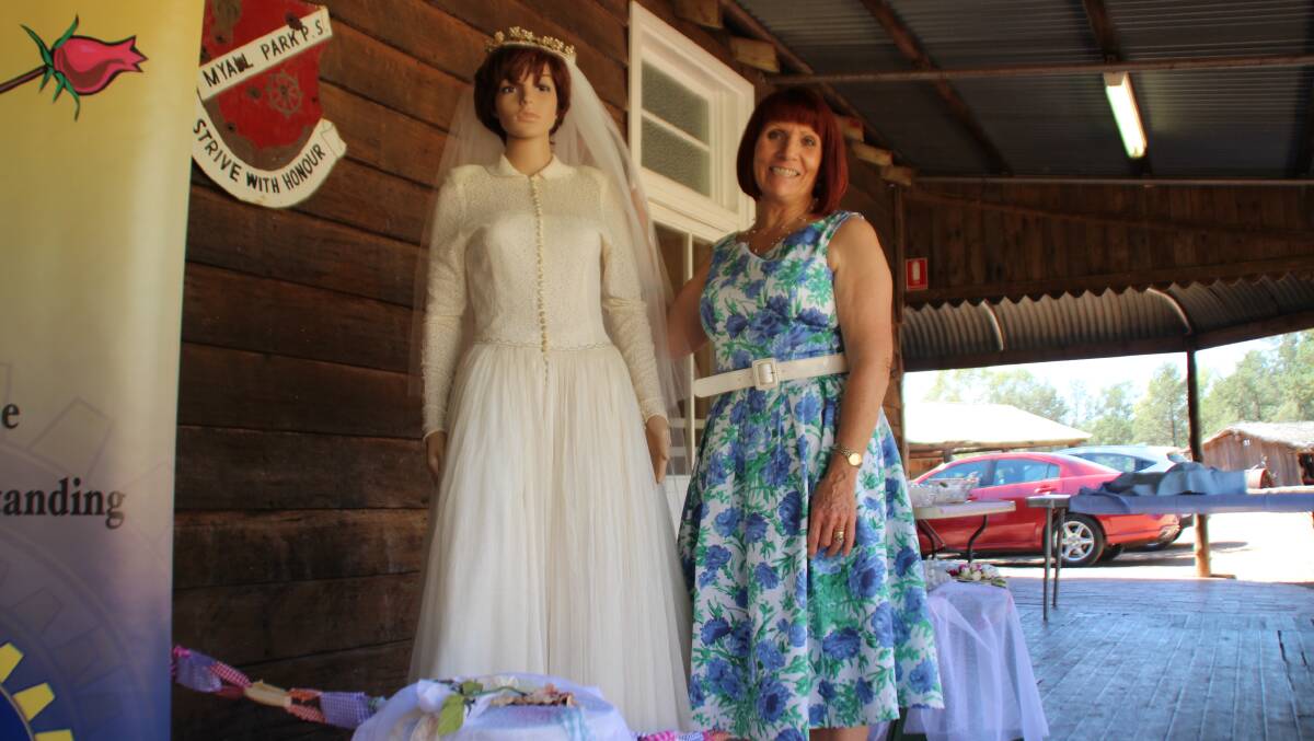 Patricia Toscan with her mother's wedding dress. 