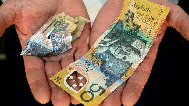 FAKE: Nine out of 10 counterfeits detected are $50 notes. Photo: Penny Stephens.
