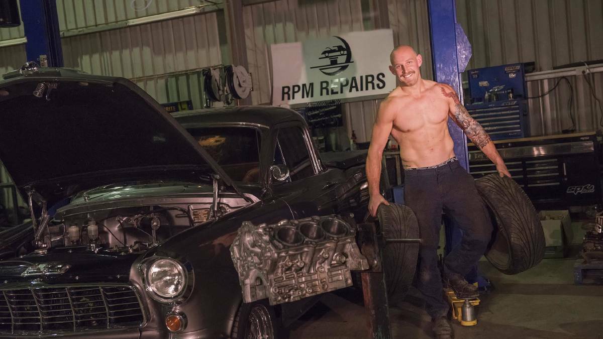 MR JULY: Guy Orton, a mechanic at RPM Repairs, was happy to take his shirt off for a good cause. PHOTO: Ginette Guidolin Photography