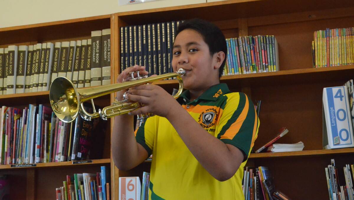 BLOW 'EM AWAY: 12-year-old Kimbal Papalii has been playing the trumpet for two years, and has no plans to stop. PHOTO: Jacinta Dickins.