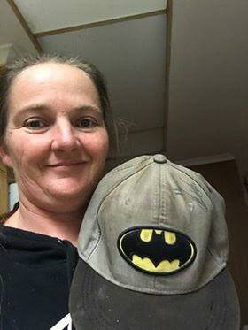 BATMAN RETURNS: Amanda Rebetzke is thrilled to be holding on to her son's much loved batman hat, found at the front of the school after a strong campaign on social media for its return.