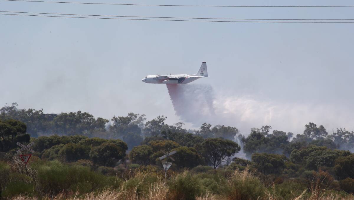 FROM THE AIR: The aircraft used in the Kidman Way fire in February last year, where a fire burnt between Tharbogang and Warburn. PHOTO: Anthony Stipo
