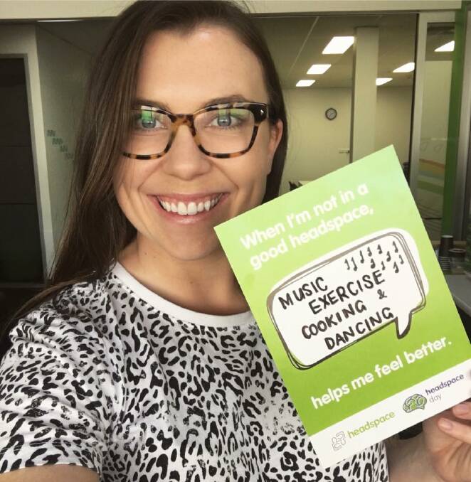 FEEL BETTER: Eliza Sellers was one of many members of the Griffith community who got involved with Mental Health Month online by posting a selfie with a tip for making themselves feel better. PHOTO: Supplied.