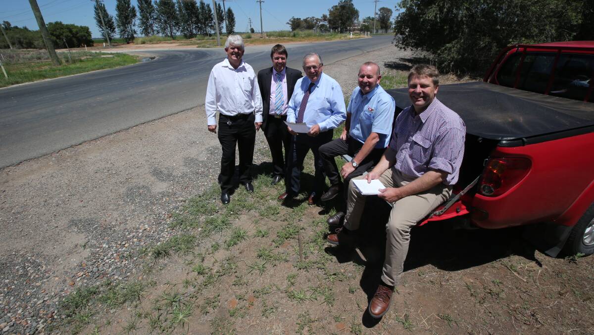 IT BEGINS: Griffith City Council's General Manager Brett Stonestreet, Director of Infrastructure and Operations Phil King, Mayor John Dal Broi, Councillor Simon Croce and Member for Murray Austin Evans. PHOTO: Anthony Stipo. 