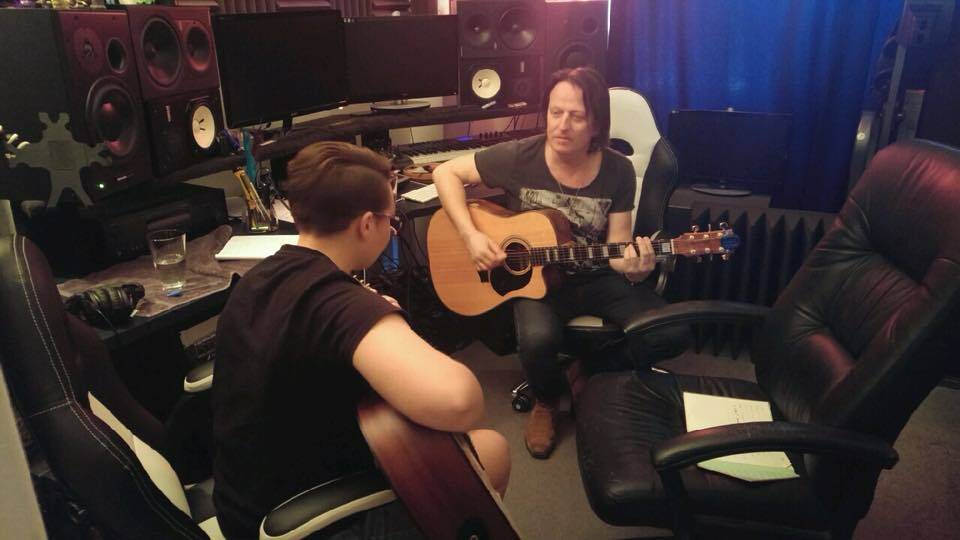 Jennifer Maher taking guitar lessons from Peter Northcote in Sydney.