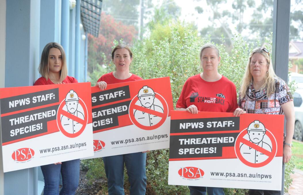 Protesters rallied around the state to protest the proposed cuts to staff in National Parks made by the state government. Photo: JESSICA COATES