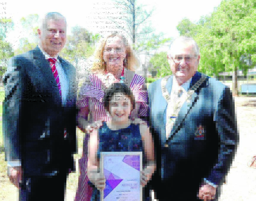 SMILES ALL ROUND: Michael McCormack, Lyndey Milan, Griffith junior citizen of the year Emily Adamson and John Dal Broi. Picture: Wendy Simpkin.