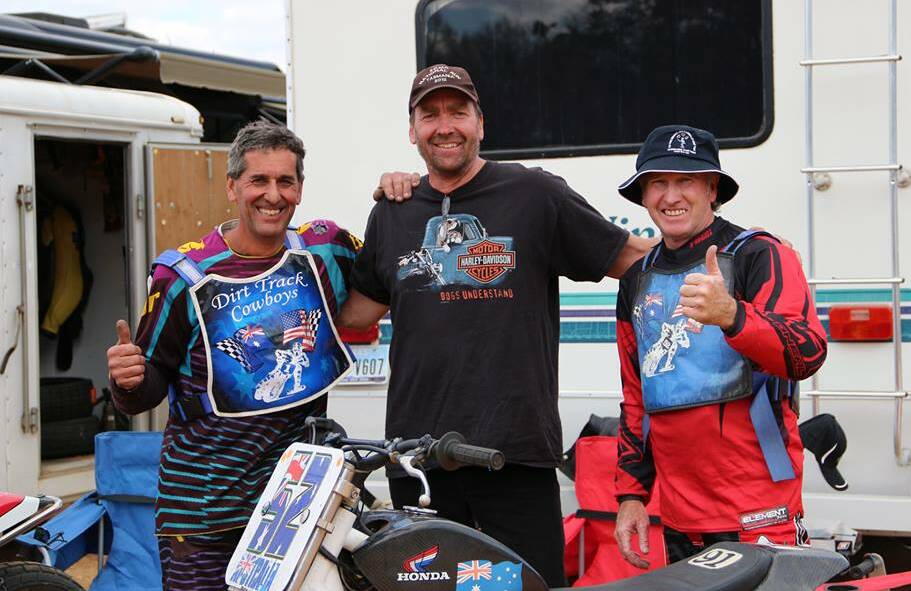 FLYING THE FLAG: David Gras, Peter Rosenboom and Peter Lee celebrate a successful trip. Picture: Supplied