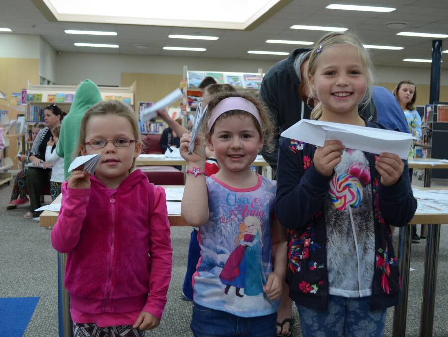 COMPLETE: Jemma Golsby-Smith, 5, Rosemary Borg, 4, and Claire Veenhuiven,7, show off their aeroplanes. Picture: Ben Jaffrey