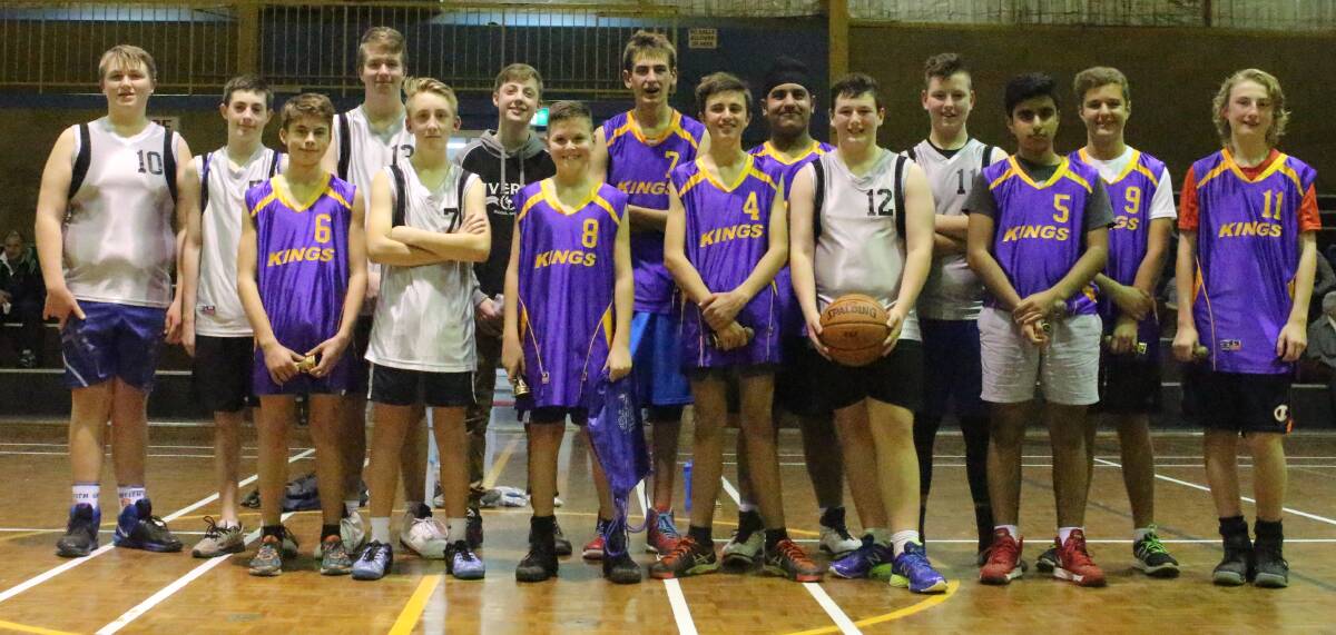 GREAT WAY TO FINISH: The Kings and the Bullets come together after a hard-fought grand final. Picture: Hannah Higgins