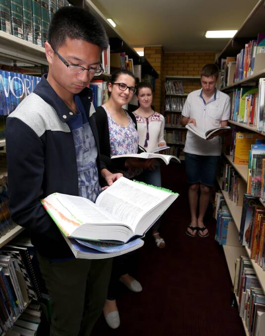 READY: Marian Catholic College year 12 students Mianno Mendoza, Sarah Marcon, Brooke Amaro and Jonathan Quarisa prepare for their HSC exams. Picture: Anthony Stipo.